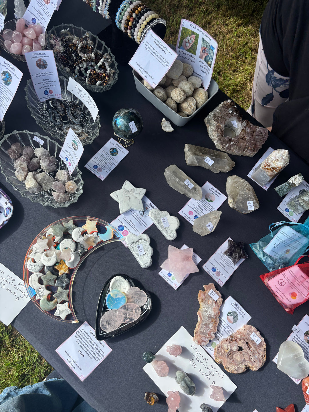 Real crystals for beginners display including raw geodes and polished tumble stones at a Lilz Luxe local community market stall.