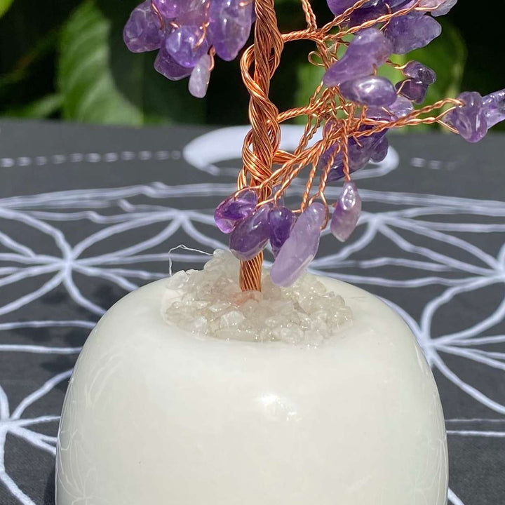 A macro perspective zooming in on the lower trunk section where the copper wire wraps tightly into the top of the solid white quartz stone base. This layout demonstrates the quality craftsmanship of the unique crystal sculpture, ideal for a bedside table or cozy meditation room sanctuary.