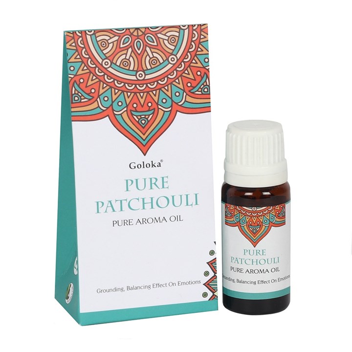 A studio shot showcasing the 10ml amber glass patchouli aroma oil dropper bottle standing next to its decorative card gift packaging against a clean white background.