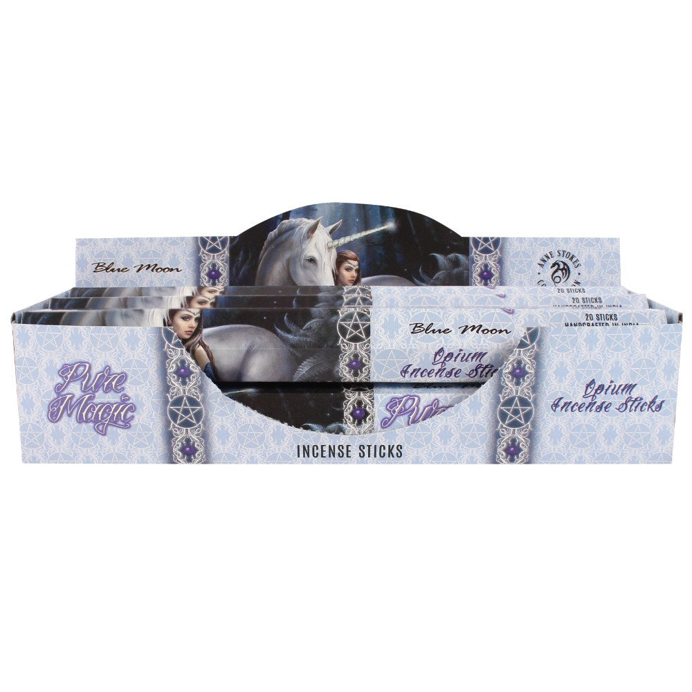A box of Blue Moon Black Magic incense sticks with a picture of a unicorn on the packaging.