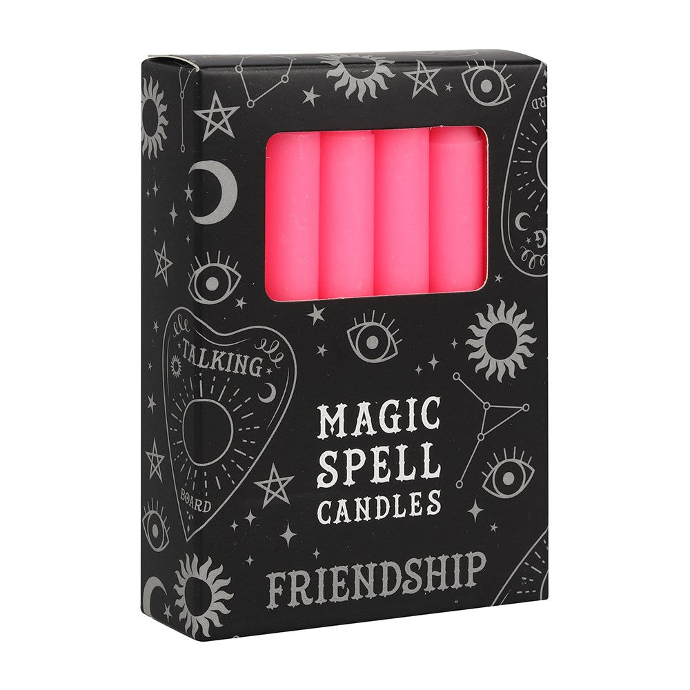 Talking Board pink friendship magic spell candles 12-pack in a black celestial box on a solid white background.