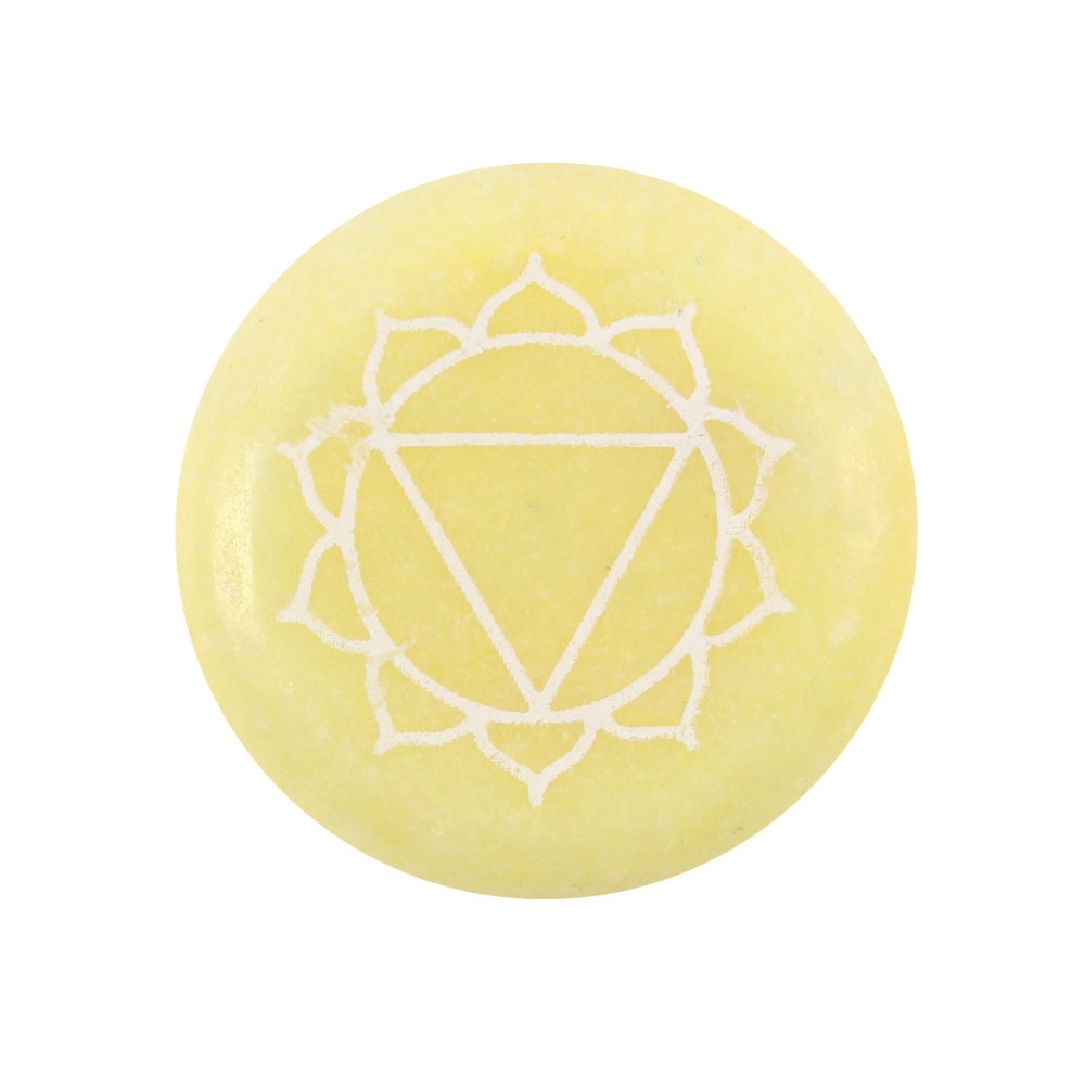 A circular, smooth yellow meditation stone engraved with the geometric Solar Plexus chakra symbol (Manipura) in a light gold finish.
