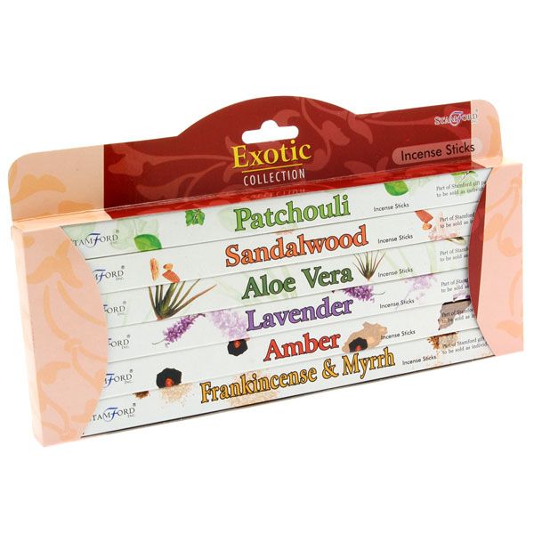A front three-quarter view of the Stamford Exotic Collection incense sticks variety gift set pack against a plain white background. The elegant packaging displays six assorted aroma styles sorted neatly in rows, showcasing printed script labels for Patchouli, Sandalwood, Aloe Vera, Lavender, Amber, and Frankincense & Myrrh to support an everyday chakra meditation routine.