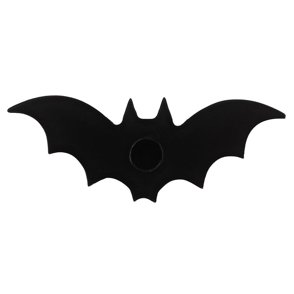A direct front-on product cutout shot showcasing the black bat-shaped spell candle stand with its wings fully extended. The clean, minimalist design features a sleek silhouette and a flat bottom base, presented sharply against a solid white background.