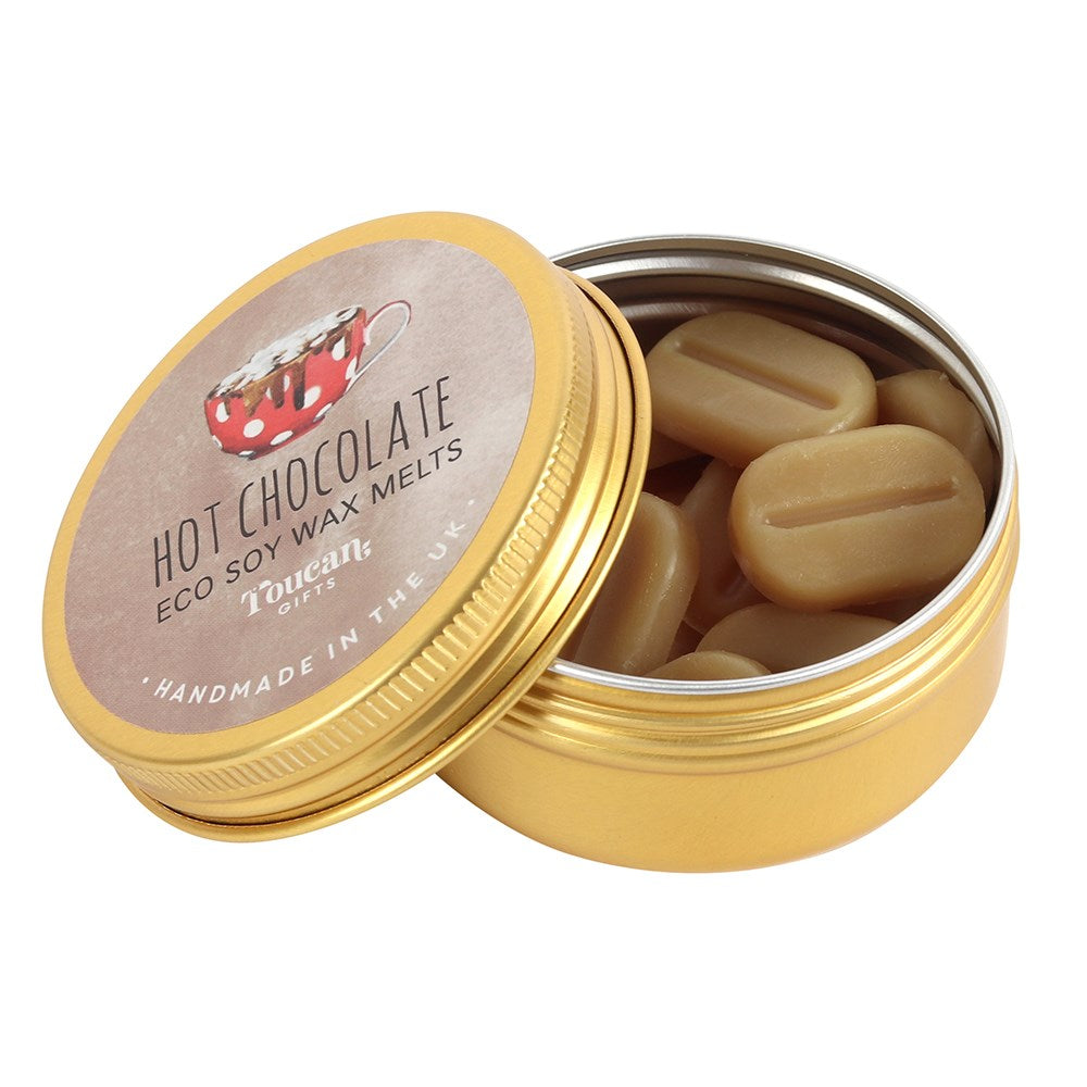 An open golden aluminium tin filled with brown coffee-bean-shaped eco soy wax melts, showcasing the elegant circular product label leaning against the base on a clean white background to inspire cosy evenings.